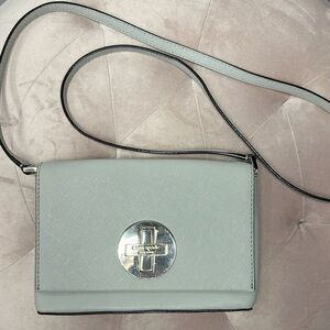 Kate Spade Newbury Lane Sally Turn
Lock Crossbody